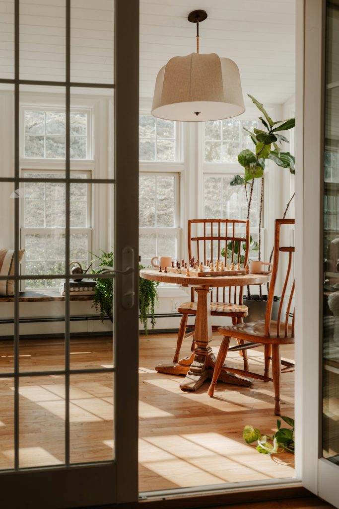 Bright neutral living room with plants and natural light